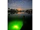 Peaceful waterfront view at twilight with still waters mirroring the sky and shoreline homes at 9404 Arnaz Cir, Port Charlotte, FL 33981