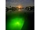 Scenic waterfront view at night with calm waters and moonlit sky reflecting off the surface at 9404 Arnaz Cir, Port Charlotte, FL 33981
