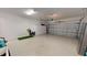 The garage is spacious, well-lit, and has sealed floors, with custom storage options at 9853 Bright Water Dr, Englewood, FL 34223
