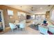 Open living space with dining area, comfortable seating, and modern decor at 9853 Bright Water Dr, Englewood, FL 34223