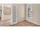 Office space with a large window and glass french doors at 10495 Atenia St, Port Charlotte, FL 33981