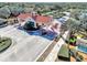Aerial view of the community entrance with well-maintained landscaping and water features at 10805 Tarflower Dr # 101, Venice, FL 34293