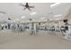 Spacious gym with a variety of modern exercise equipment and plenty of natural light at 10805 Tarflower Dr # 101, Venice, FL 34293
