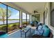 Relax on this lanai with a beautiful view of the lake and comfortable seating at 10805 Tarflower Dr # 101, Venice, FL 34293