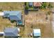 Overhead view showing the roofs of houses in a residential area at 12359 Deepwoods Ave, Port Charlotte, FL 33981