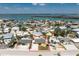 Aerial view of the property highlighting the home's location near the bay in a vibrant neighborhood at 1245 Gulf Blvd, Englewood, FL 34223