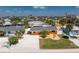 Aerial shot of a charming property showcasing its well-maintained landscaping, vibrant exterior, and ideal location at 1245 Gulf Blvd, Englewood, FL 34223