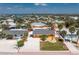 Aerial view of a cozy home outlined in red, showcasing its location in a vibrant coastal neighborhood at 1245 Gulf Blvd, Englewood, FL 34223