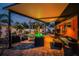 Inviting backyard with a sparkling pool, spa, covered patio, and comfortable seating for outdoor relaxation at 1245 Gulf Blvd, Englewood, FL 34223