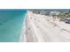 Stunning beach view with clear turquoise water and sandy shorelines, ideal for swimming, sunbathing, and beachcombing at 1245 Gulf Blvd, Englewood, FL 34223