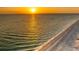 Breathtaking sunset over the tranquil ocean and sandy beach at 1245 Gulf Blvd, Englewood, FL 34223