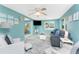 Inviting living room featuring comfortable seating, bright colors, and nautical décor, creating a relaxing coastal atmosphere at 1245 Gulf Blvd, Englewood, FL 34223