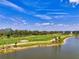 A gorgeous community with a beautiful golf course and lakes, surrounded by lush landscaping for outdoor living at 12470 Wellen Golf St # 207, Venice, FL 34293