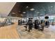 Well-equipped gym featuring a variety of machines and weights, promoting a healthy and active lifestyle at 12470 Wellen Golf St # 207, Venice, FL 34293