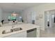 Spacious kitchen area with stainless steel appliances and plenty of countertop space at 12470 Wellen Golf St # 208, Venice, FL 34293