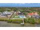 Expansive waterfront property with meticulously maintained grounds, pool, putting green and dock at 1275 Bayshore Dr, Englewood, FL 34223