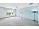 Light and airy bedroom with large windows offering scenic views at 1275 Bayshore Dr, Englewood, FL 34223