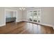 Dining room with hardwood floors and french doors at 1275 Bayshore Dr, Englewood, FL 34223