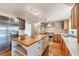 Spacious kitchen with a large island, stainless appliances, and custom cabinetry at 1275 Bayshore Dr, Englewood, FL 34223