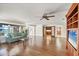 Spacious living room featuring hardwood floors, ceiling fan, and lots of natural light and an ocean view at 1275 Bayshore Dr, Englewood, FL 34223