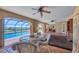 Relaxing patio area overlooking pool and stunning waterfront views at 1275 Bayshore Dr, Englewood, FL 34223