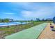 Enjoy outdoor activities with a shuffleboard court, tennis court, and beautiful water views at 1275 Bayshore Dr, Englewood, FL 34223