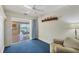 Bright sitting room leading to covered patio with water view at 1275 Bayshore Dr, Englewood, FL 34223
