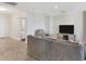 Relaxing living room with contemporary furnishings, neutral decor, and a television at 13113 Gasparilla Rd # A503, Placida, FL 33946