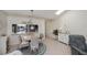 Open-concept dining space with kitchen access, natural light, and comfortable seating at 148 Jose Gaspar Dr # 148, Englewood, FL 34223