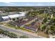 Aerial view of the Palm Manor apartments featuring a community pool and parking at 1531 Placida Rd # 201, Englewood, FL 34223
