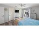 Bright bedroom features a walk-out balcony and calming decor at 1531 Placida Rd # 201, Englewood, FL 34223