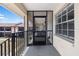 Screened-in porch with decorative elements and views of the exterior grounds at 1531 Placida Rd # 201, Englewood, FL 34223
