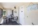 Cozy outdoor seating on the patio with decorative nautical accents at 1531 Placida Rd # 201, Englewood, FL 34223