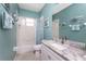 Bathroom featuring a white vanity with a granite countertop and a tub-shower combo at 15674 Applewhite Cir, Port Charlotte, FL 33981