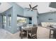 Charming dining area featuring tile floors, natural light, and seamless access to the living space and pool views at 15674 Applewhite Cir, Port Charlotte, FL 33981