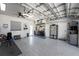 Well-organized garage features ample workspace, storage, and durable epoxy flooring at 15674 Applewhite Cir, Port Charlotte, FL 33981