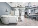 Spacious living room featuring modern furniture, tile flooring, and an open layout perfect for gatherings and relaxation at 15674 Applewhite Cir, Port Charlotte, FL 33981
