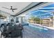 Enclosed lanai with private pool and spa, perfect for relaxation and entertaining with waterfront views at 15674 Applewhite Cir, Port Charlotte, FL 33981