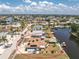 Waterfront home with boat dock, tiki hut, and pool in a quiet residential neighborhood at 158 Morgan Se Ln, Port Charlotte, FL 33952