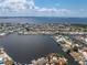 Expansive aerial view highlighting the community's waterfront homes and easy access to the open water, perfect for boating at 158 Morgan Se Ln, Port Charlotte, FL 33952