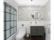Updated bathroom features a tile shower and classic vanity, toilet and fixtures at 158 Morgan Se Ln, Port Charlotte, FL 33952