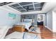 Nautical-themed main bedroom featuring a decorative ceiling, hardwood floors, and an en-suite bathroom at 158 Morgan Se Ln, Port Charlotte, FL 33952
