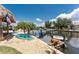 Waterfront home featuring a private dock with two kayaks and a relaxing seating area to enjoy scenic water views at 158 Morgan Se Ln, Port Charlotte, FL 33952