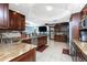 Gourmet kitchen boasts granite countertops, stainless steel appliances, and ample cabinet space at 158 Morgan Se Ln, Port Charlotte, FL 33952