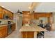Large kitchen offering ample counter space, stainless steel appliances and granite counters at 1585 Poinciana Rd, Venice, FL 34293
