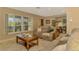Cozy living room with comfortable seating, stylish decor, and natural light at 1585 Poinciana Rd, Venice, FL 34293