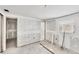Basement with multiple doorways, a window and bare drywall ready for customization at 17 Southwind Dr, Englewood, FL 34223
