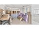 Living room featuring tile flooring and partially renovated walls, studs, and trim at 17 Southwind Dr, Englewood, FL 34223