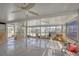 Enclosed sunroom with lots of natural light overlooking the backyard and canal at 17 Southwind Dr, Englewood, FL 34223