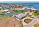 Waterfront property with a private dock, palm trees, and gorgeous views at 1915 Illinois Ave, Englewood, FL 34224